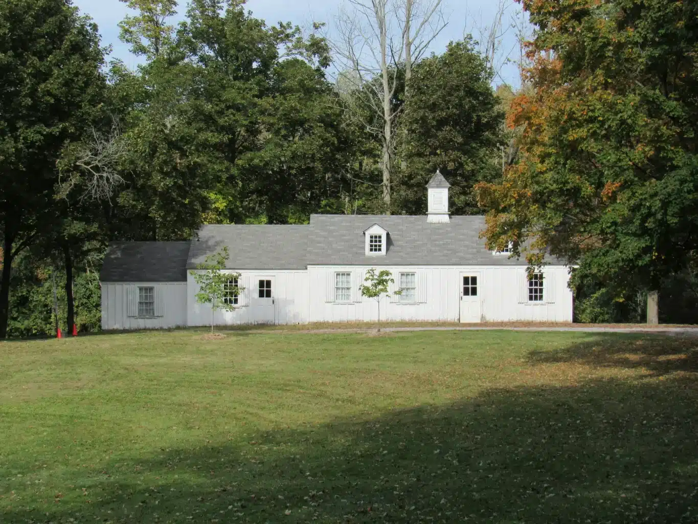 view of a white heritage house on a farm near georgetown ontario