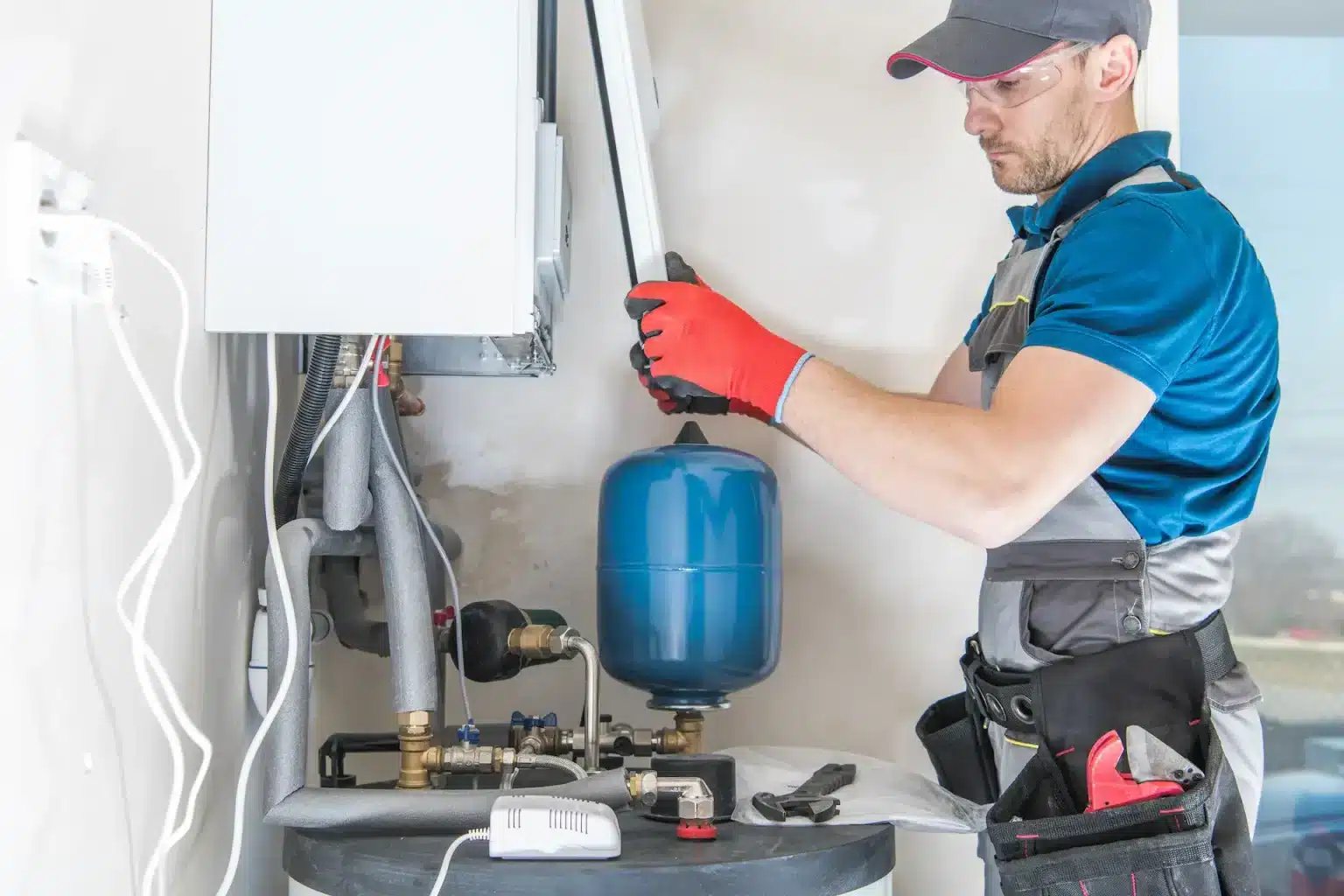 hvac tech conducting expert heating services