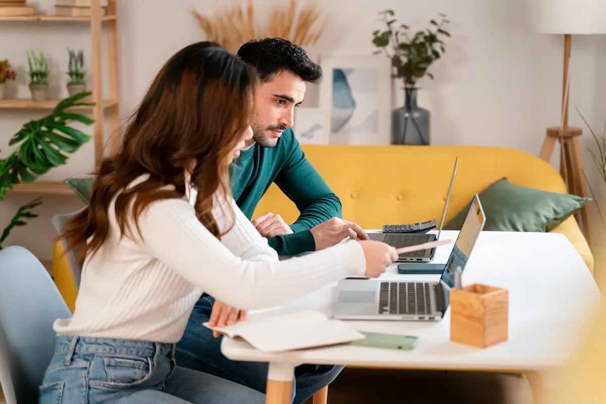 couple reviewing a quote on their laptop