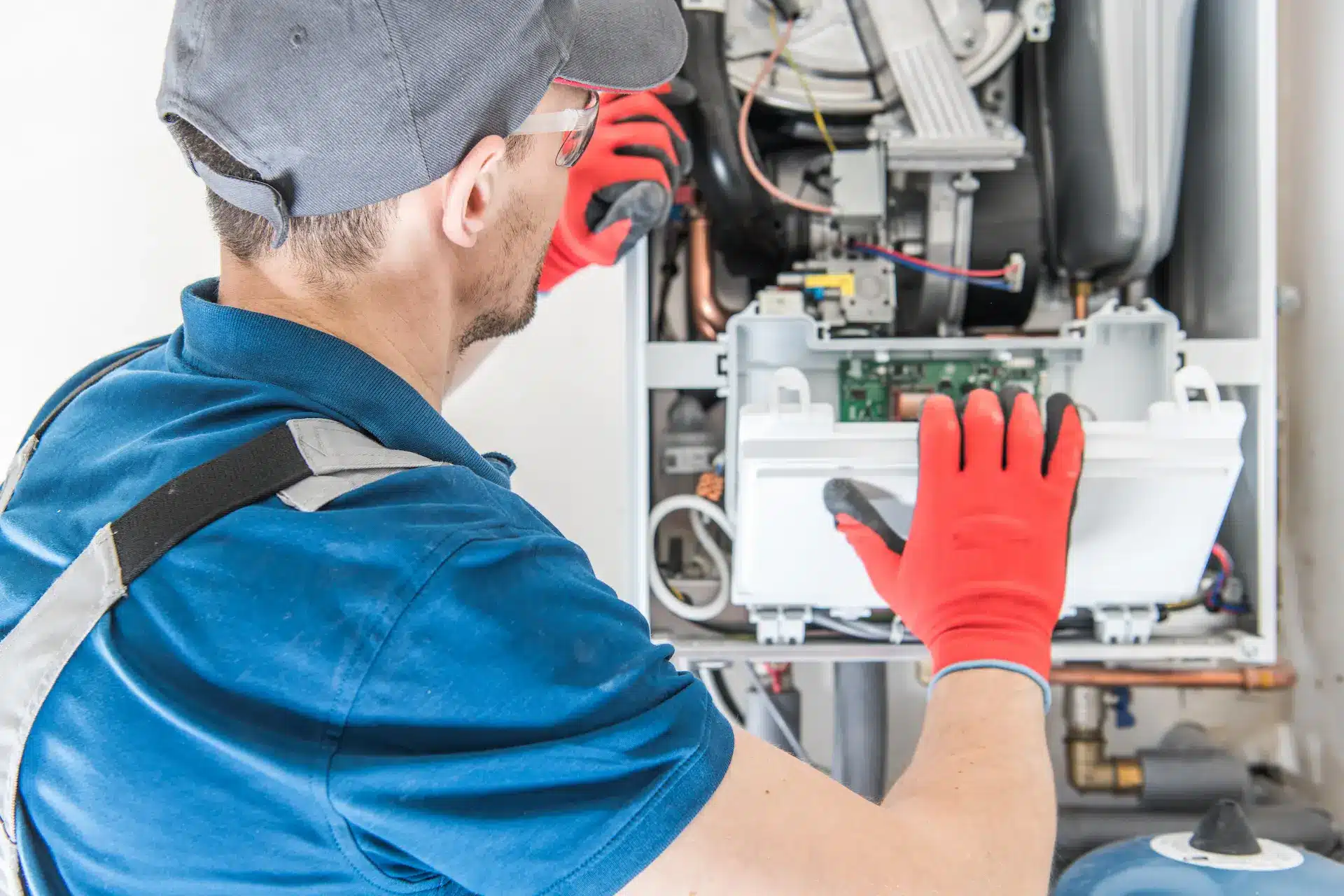 MWS HVAC technician repairing gas furnace